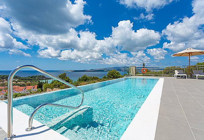 Private infinity pool and terrace with panoramic sea views . - Villa Lassi Fos . (Photo Gallery) }}