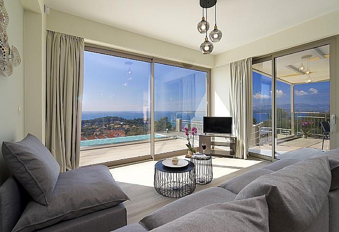 Air conditioned living room with TV and beautiful view  . - Villa Lassi Fos . (Galerie de photos) }}