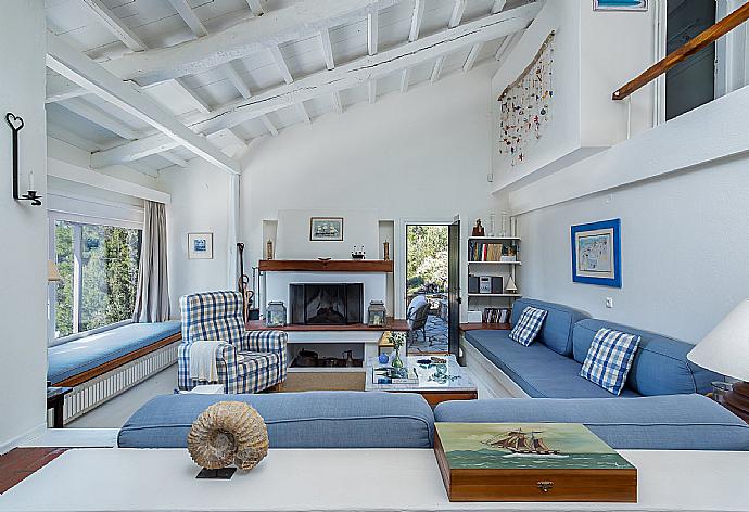 Beautiful living room with outdoor access . - Villa Pelago . (Photo Gallery) }}