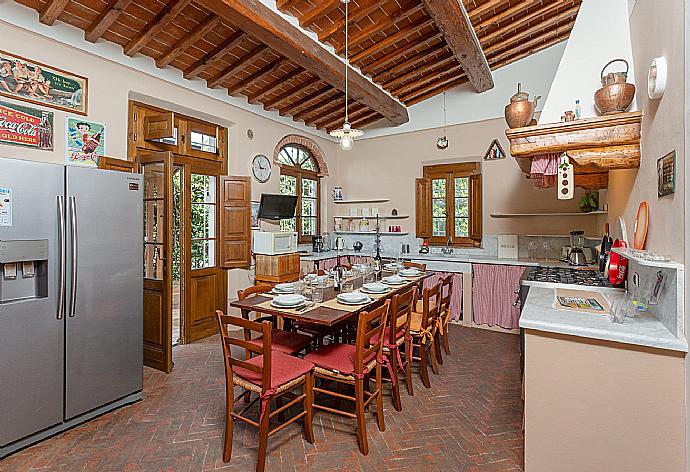 Equipped kitchen with dining area and terrace access . - Villa Rossa . (Photo Gallery) }}