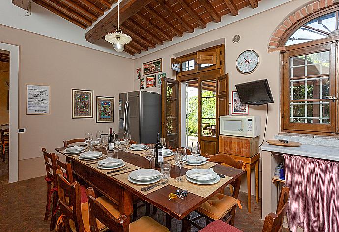 Equipped kitchen with dining area and terrace access . - Villa Rossa . (Photo Gallery) }}