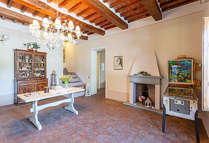 Living area with ornamental fireplace . - Villa Rossa . (Photo Gallery) }}