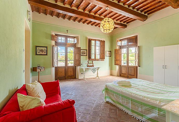 Double bedroom on ground floor with en suite bathroom and terrace access . - Villa Rossa . (Photo Gallery) }}