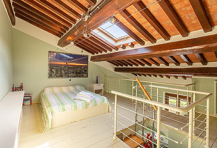 Double bedroom in loft of first floor with A/C . - Villa Rossa . (Photo Gallery) }}