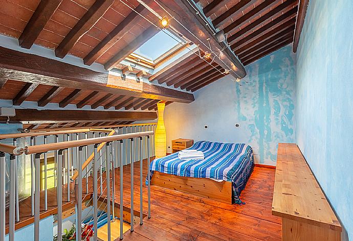 Double bedroom in loft of first floor with A/C . - Villa Rossa . (Photo Gallery) }}