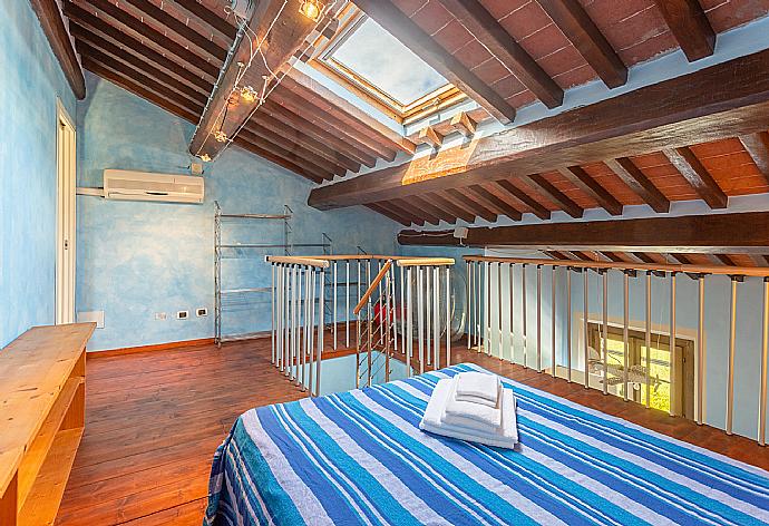 Double bedroom in loft of first floor with A/C . - Villa Rossa . (Photo Gallery) }}