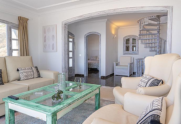 Living room with Ornamental fireplace, TV and beautiful view . - Villa Oasis de Asomada . (Galerie de photos) }}