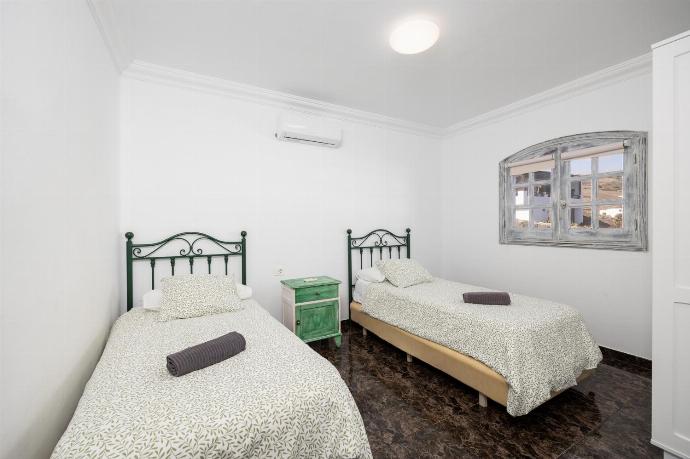 Unit 3: twin bedroom with A/C . - Villa Oasis de Asomada . (Galería de imágenes) }}