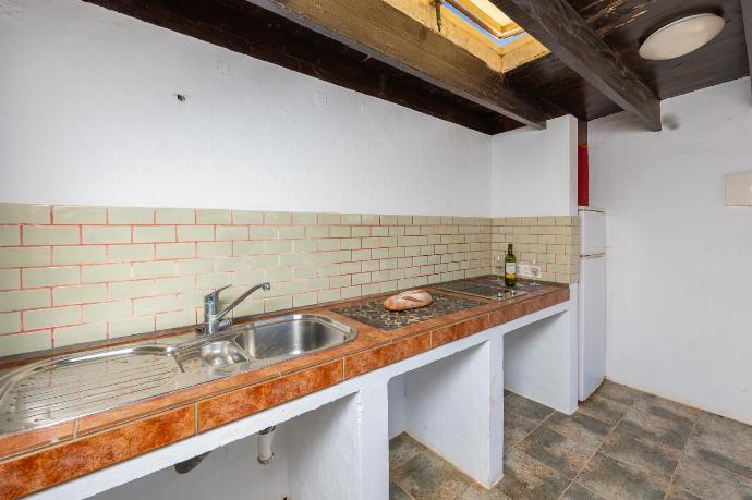 Sheltered terrace area with kitchenette . - Villa Oasis de Asomada . (Galería de imágenes) }}