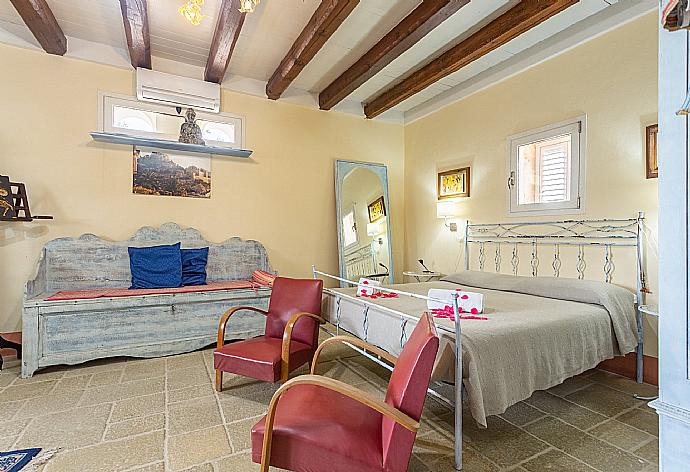 Double bedroom with extra single bed and A/C . - Villa Nina . (Photo Gallery) }}