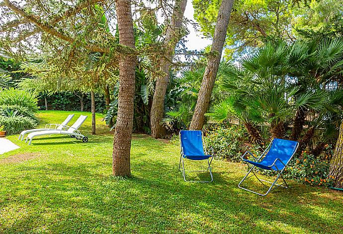 Garden area . - Villa Venere . (Galerie de photos) }}