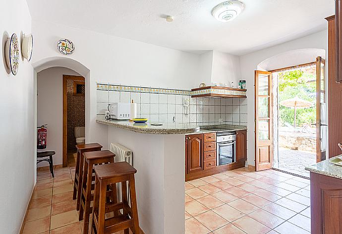 Equipped kitchen . - Villa Can Soler II . (Fotogalerie) }}