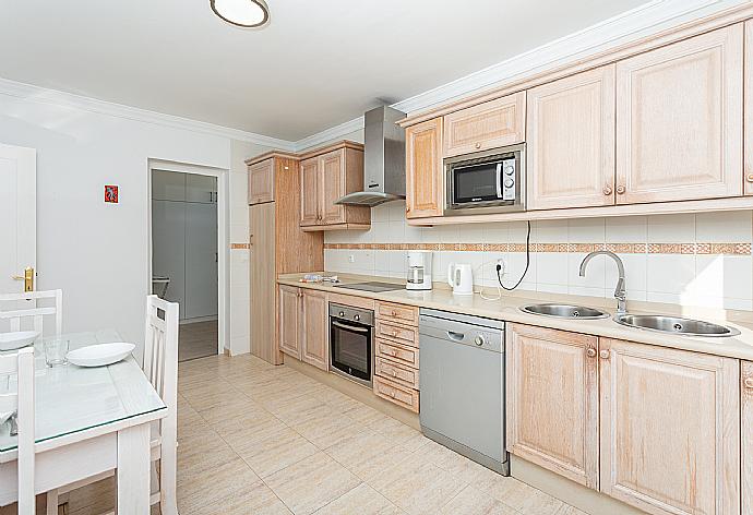 Equipped kitchen with dining area . - Villa Diego . (Photo Gallery) }}