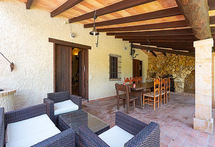 Sheltered terrace area . - Villa Cortijo 1 . (Galerie de photos) }}