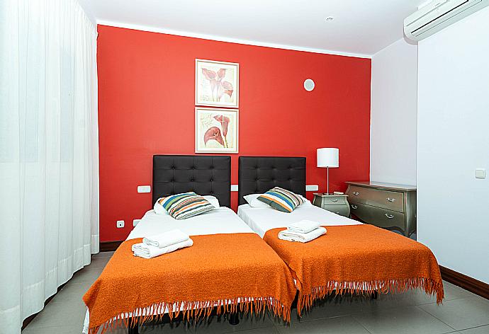 Air-conditioned twin bedroom  . - Villa Palmera . (Photo Gallery) }}
