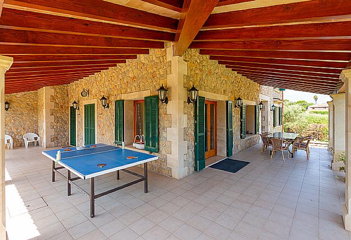 Sheltered terrace area with table tennis . - Villa Padilla . (Photo Gallery) }}