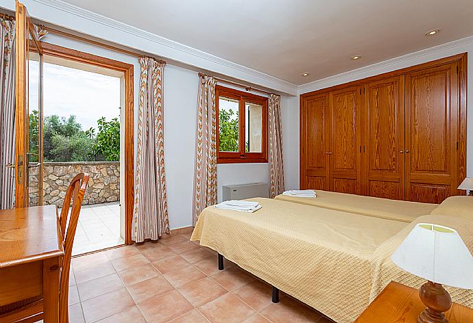 Twin bedroom with A/C and upper terrace access . - Villa Padilla . (Photo Gallery) }}