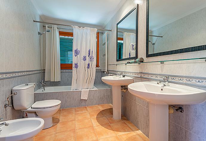 Family bathroom with bath and shower . - Villa Padilla . (Photo Gallery) }}