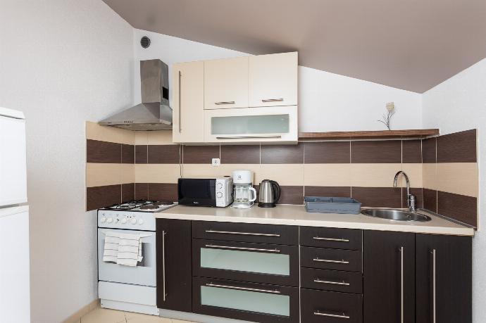 First floor: equipped kitchen . - Villa Casa Toni . (Fotogalerie) }}