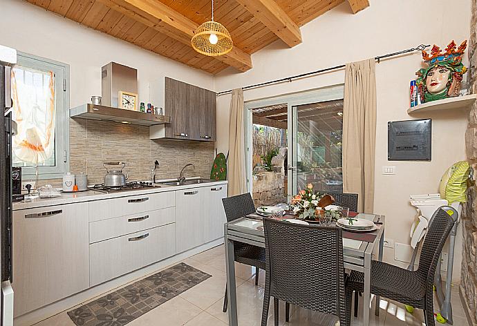 Equipped kitchen with dining area . - Villa La Mia Sicilia . (Photo Gallery) }}