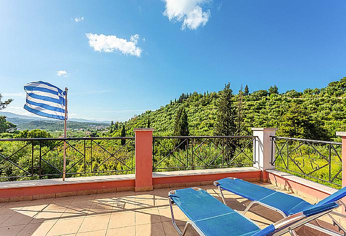 Upper terrace with stunning views . - Villa Eliza . (Photo Gallery) }}