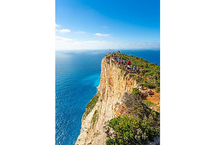 Cliffs near Shipwreck Beach . - Villa Eliza . (Photo Gallery) }}