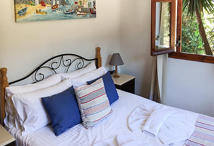 Double bedroom with A/C . - Villa Eliza . (Photo Gallery) }}