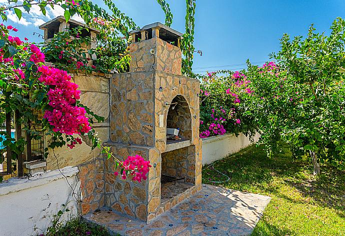 BBQ area . - Villa Atlantis . (Galerie de photos) }}