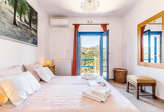 Double bedroom with A/C and balcony access. . - Villa Levanda . (Photo Gallery) }}