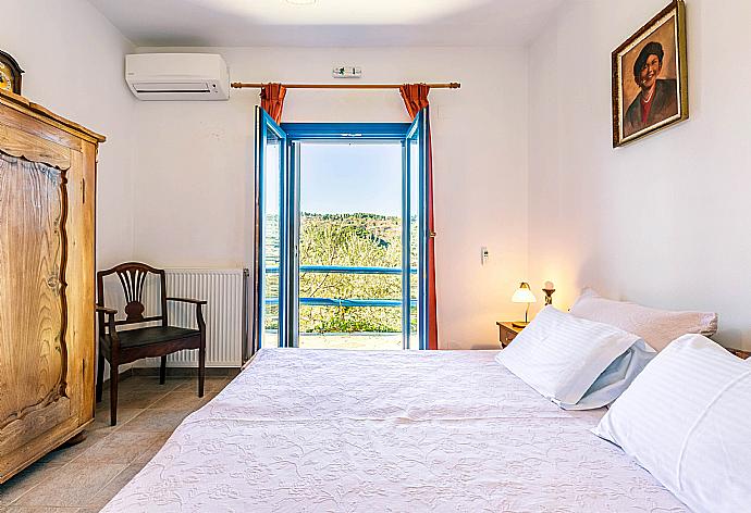 Double bedroom with A/C and balcony access. . - Villa Levanda . (Photo Gallery) }}