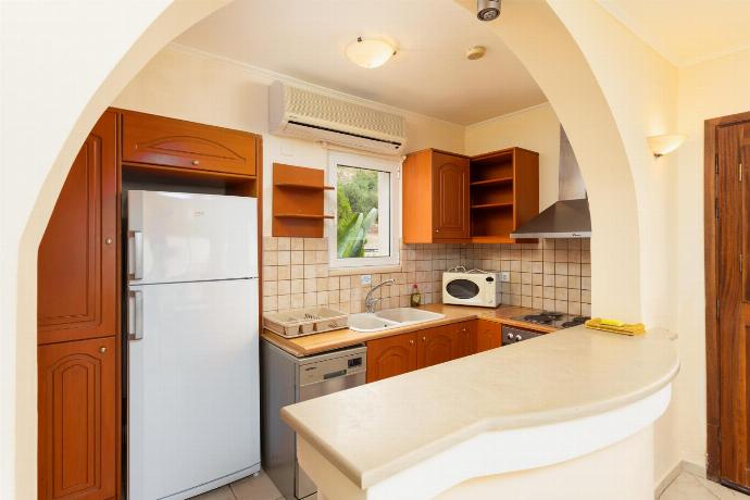 Equipped kitchen . - Villa Callistemon . (Fotogalerie) }}