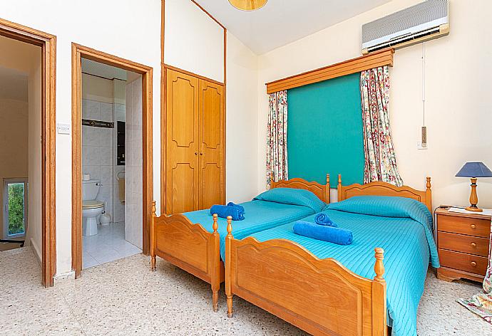 Twin bedroom with en suite bathroom, A/C, and balcony with sea views . - Argaka Sun Villa Tria . (Photo Gallery) }}