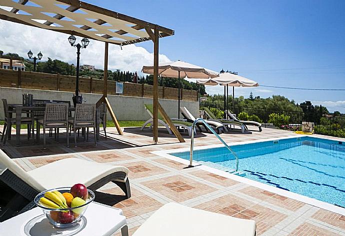 Private pool and terrace with sea views . - Rose Villa . (Photo Gallery) }}