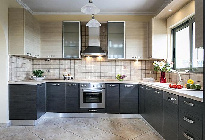 Equipped kitchen . - Rose Villa . (Photo Gallery) }}