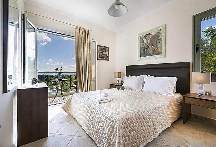 Double bedroom with A/C . - Rose Villa . (Photo Gallery) }}