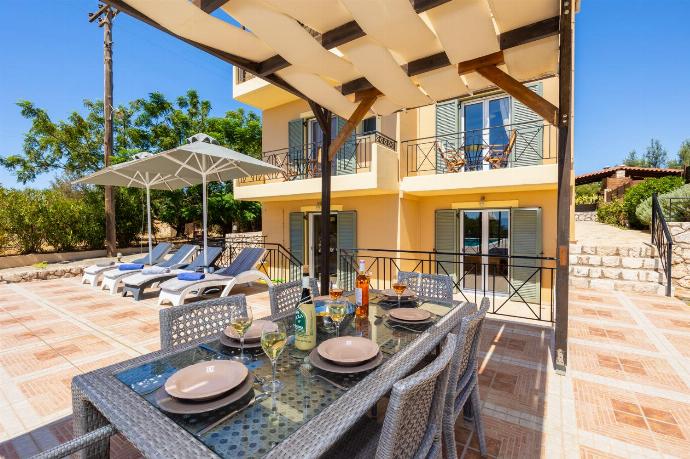 Sheltered terrace area . - Rose Villa . (Photo Gallery) }}