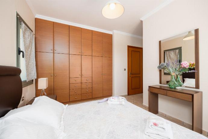 Double bedroom with en suite bathroom, A/C, and sea views . - Rose Villa . (Photo Gallery) }}
