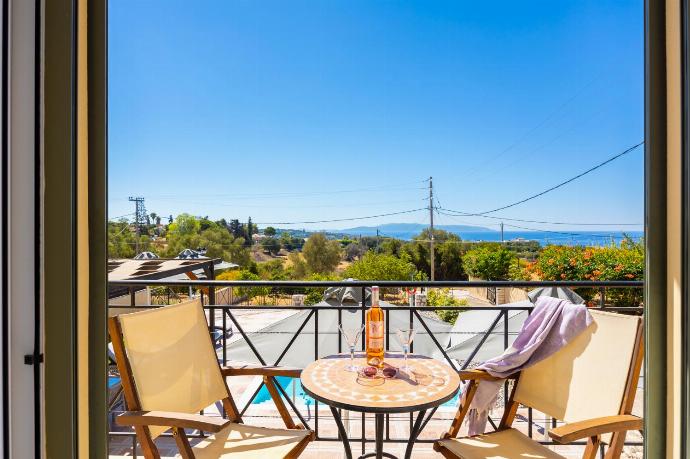 Balcony with sea views . - Rose Villa . (Photo Gallery) }}