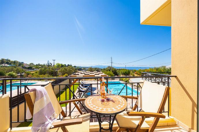 Balcony with sea views . - Rose Villa . (Photo Gallery) }}