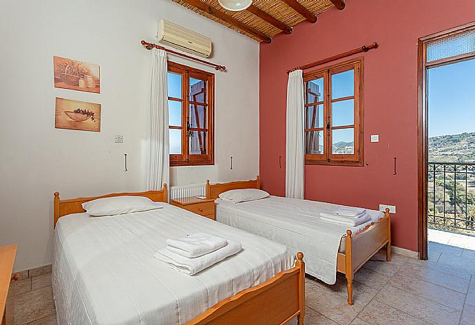 Twin bedroom with A/C and balcony access . - Villa Alexandros Palace . (Photo Gallery) }}