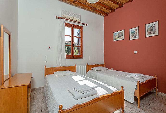 Twin bedroom with A/C . - Villa Alexandros Palace . (Photo Gallery) }}