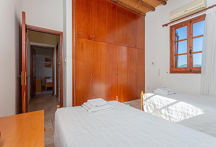 Twin bedroom with A/C . - Villa Alexandros Palace . (Photo Gallery) }}