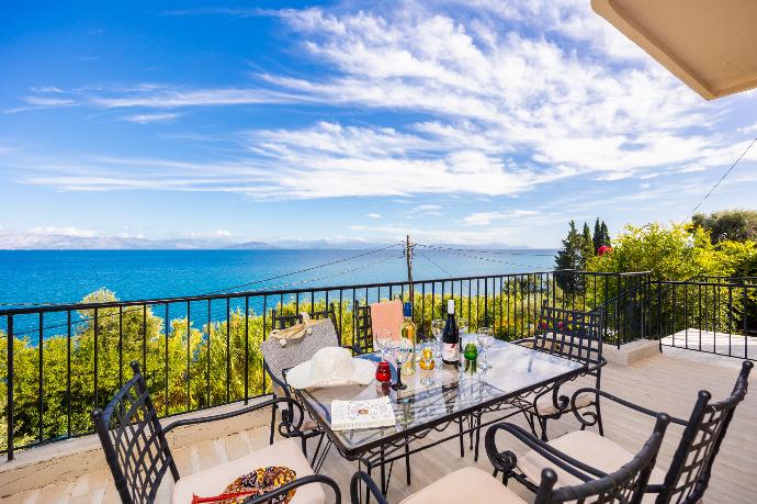 Terrace area with sea views . - Villa Litsa . (Photo Gallery) }}