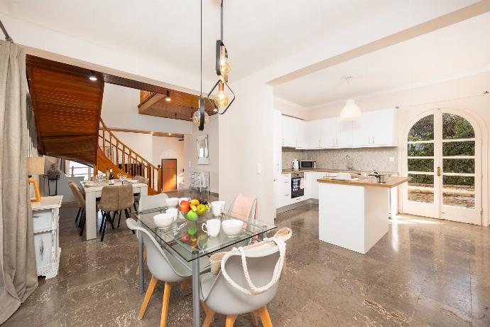 Dining area with A/C . - Villa Litsa . (Photo Gallery) }}