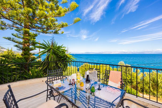 Terrace area with sea views . - Villa Litsa . (Photo Gallery) }}