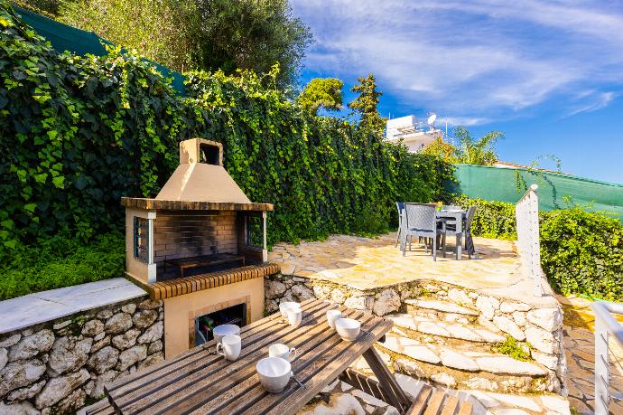 Terrace area with BBQ . - Villa Litsa . (Photo Gallery) }}