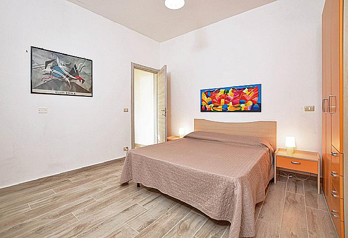 Double bedroom with A/C . - Villa Villino Blu . (Photo Gallery) }}