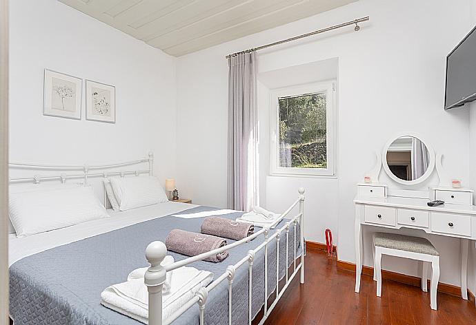 Double bedroom with A/C and TV . - Villa Constadina . (Photo Gallery) }}