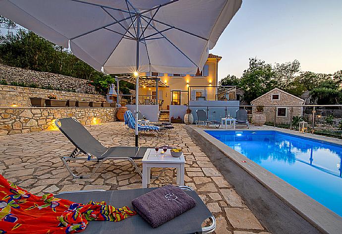 Private pool with outdoor area . - Villa Constadina . (Photo Gallery) }}