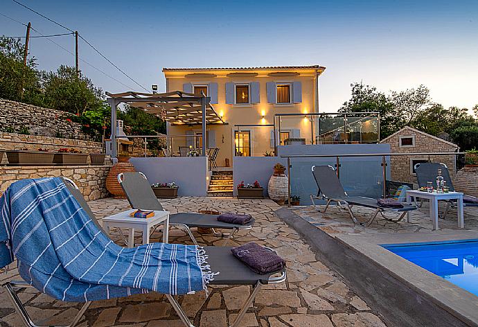 Private pool with outdoor area . - Villa Constadina . (Photo Gallery) }}